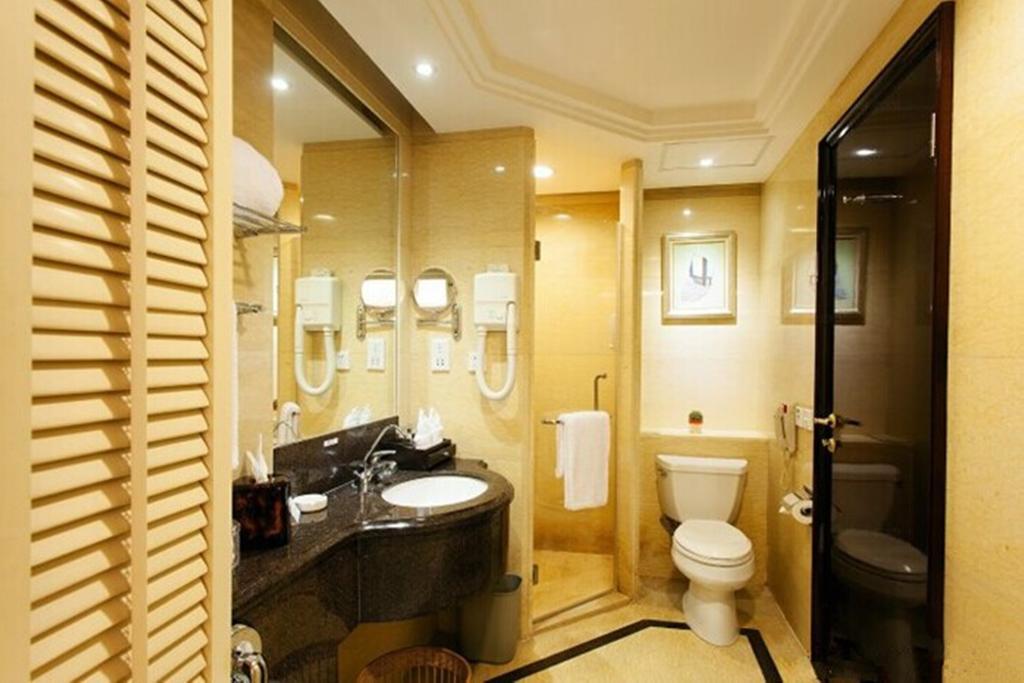 Tienyow Grand Hotel Haikou  Rom bilde