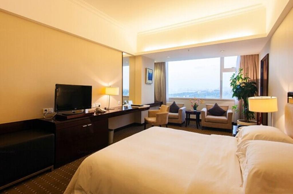 Tienyow Grand Hotel Haikou  Rom bilde