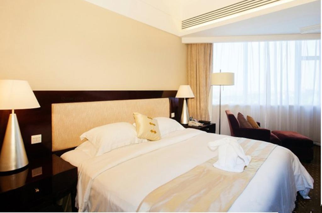 Tienyow Grand Hotel Haikou  Rom bilde