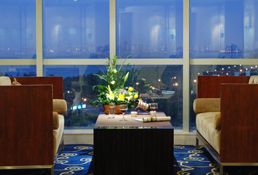 Tienyow Grand Hotel Haikou  Rom bilde