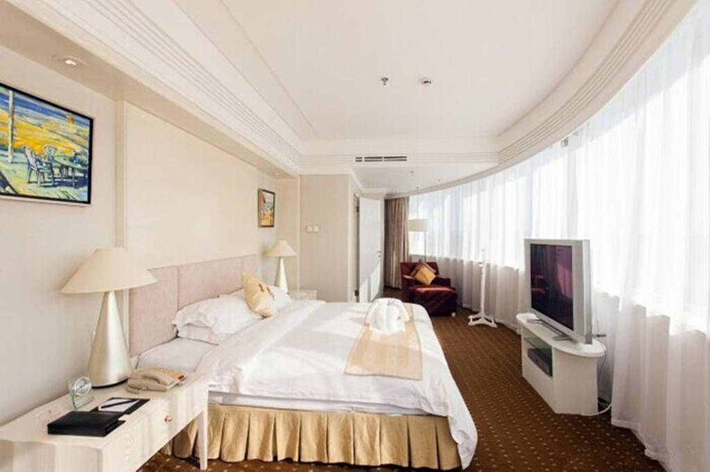 Tienyow Grand Hotel Haikou  Rom bilde