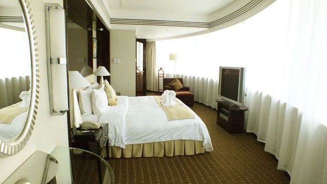 Tienyow Grand Hotel Haikou  Rom bilde