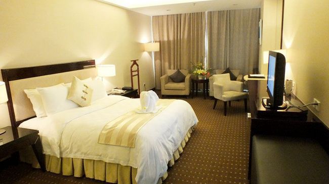 Tienyow Grand Hotel Haikou  Rom bilde